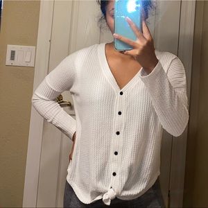 white button sweater